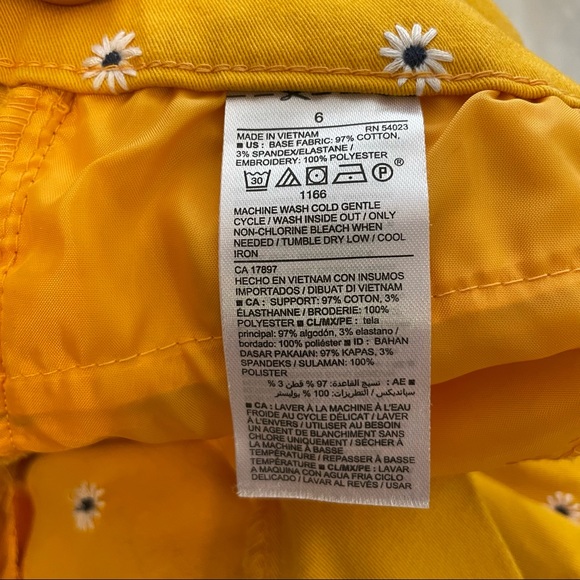 Daisy patterned yellow Old Navy Pixie Pants - Picture 6 of 6